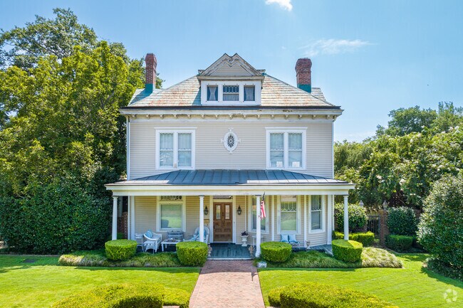 Historical homes are set back from the road in well landscaped yards in Harrisburg.