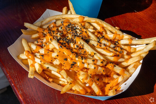 Try some furikake fries at The Lone Crow restaurant located in Alvarado neighborhood.