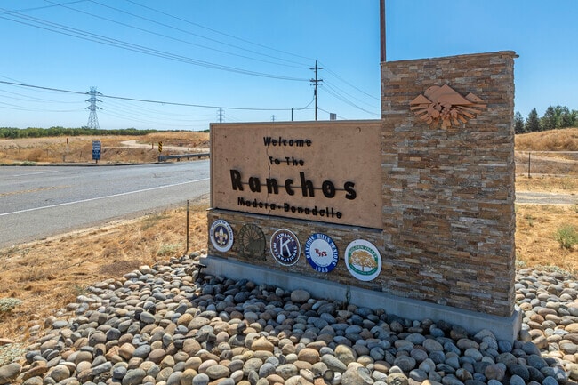 There is a newly placed monument sign that welcomes visitors to Bonadelle Ranchos.