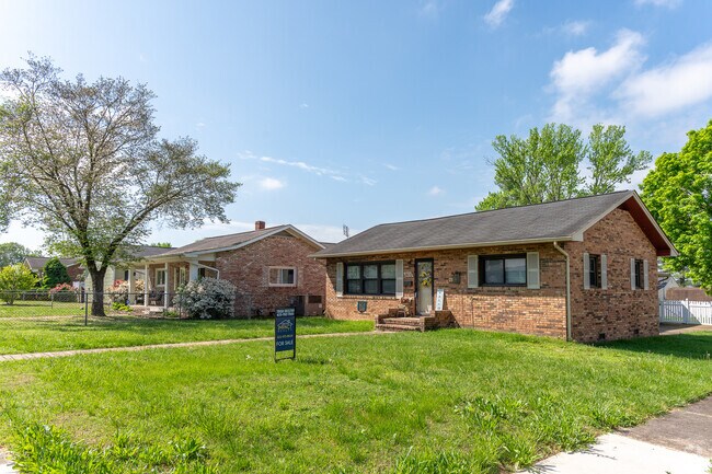 Cottage homes with front yards line peaceful streets in Borden Village.