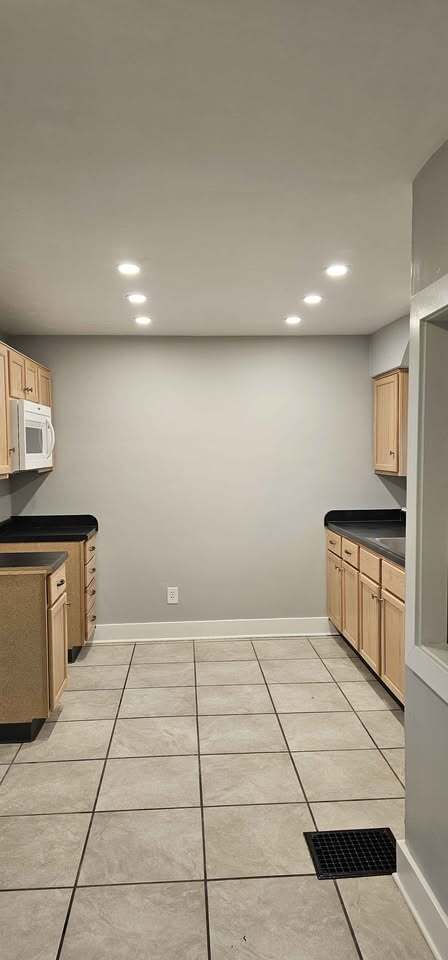 Stove and refrigerator have been installed but not pictured (white)