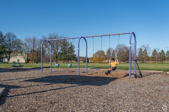 Kids flock to the playground at College Green Park after school.