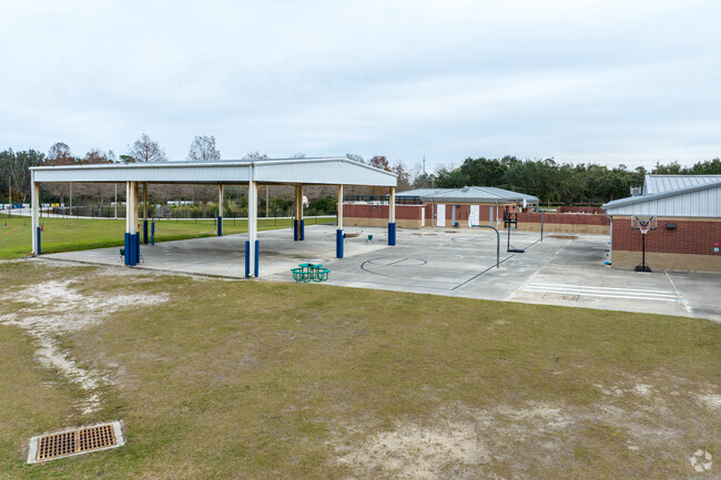 Students at Cypress Creek Elementary School  can access covered and outdoor basketball areas.