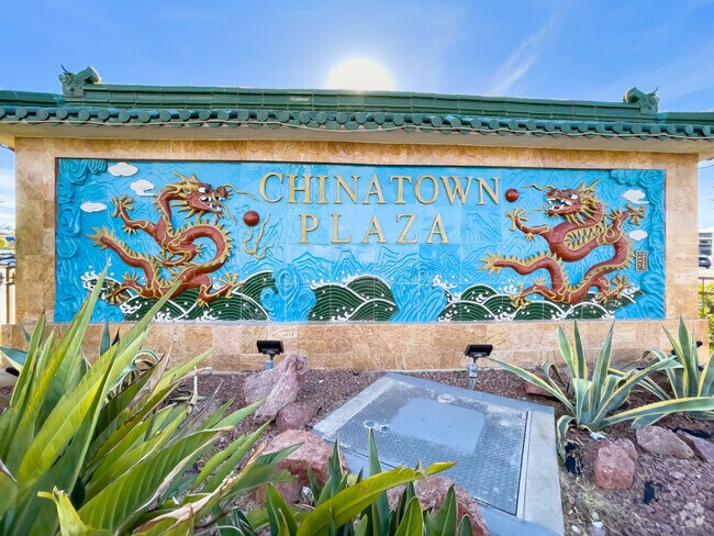 The Chinatown Plaza sign welcomes locals to the Chinatown neighborhood.