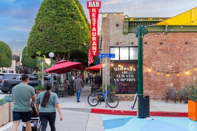 Enjoy an evening stroll in the Village where you can find food, drinks & entertainment.