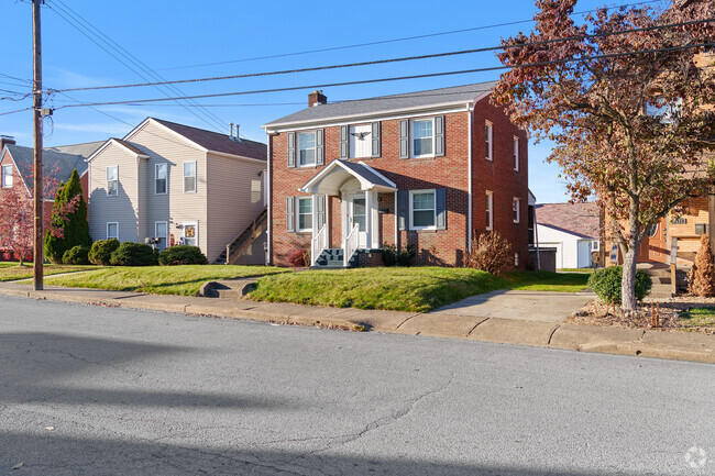 This colonial revivals home is large and provides space for a growing family.