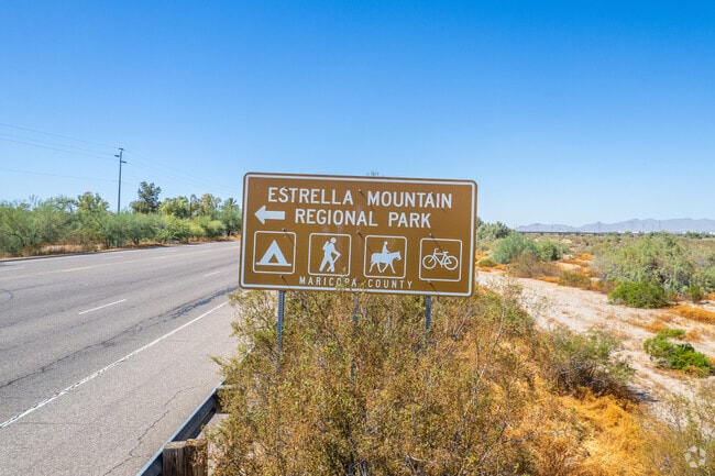 Welcoming visitors with a charming park sign at Estrella Mountain Regional Park near El Mirage.