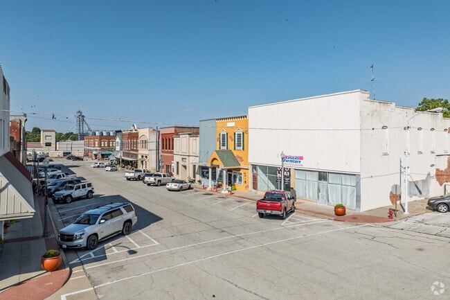 Businesses line Locust Street in downtown Aurora.