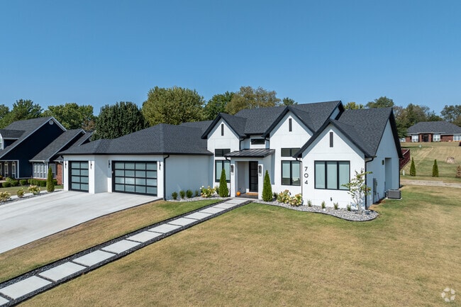 Large modern homes in the Shady Grove neighborhood have larger lots and quiet streets.
