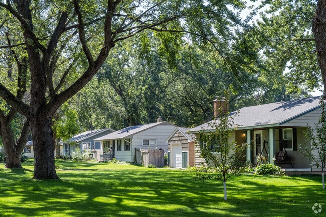 Mature trees provide shade for ranch-style homes in Saint Paul Park.