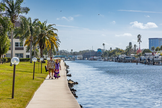Residents enjoy a morning walk along the seawalls in Flor-A-Mar.