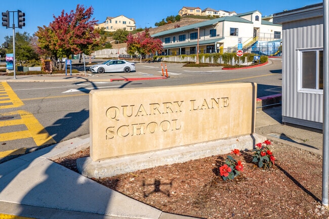 A view of the The Quarry Lane School sign from the street.