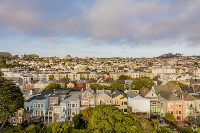 The sun sets over rows of homes in the Inner Richmond district of San francsico.