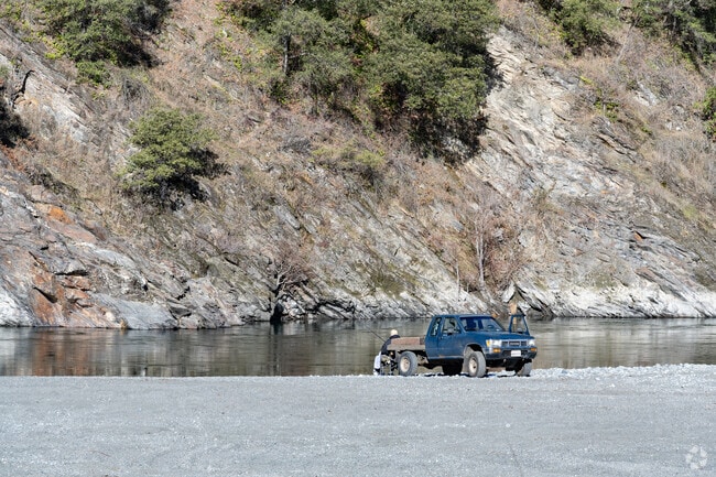 A fisherman enjoys the afternoon sun in Willow Creek.
