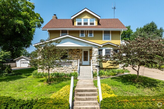 Stone facade craftsman homes stand tall in Fairland Heights.