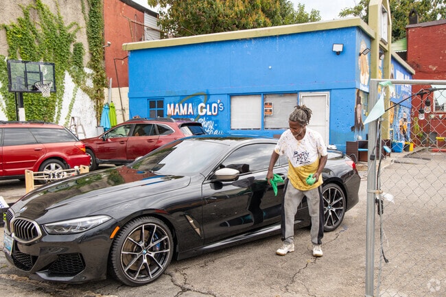 Mama Glo's carwash is a community staple in Harlem Park.