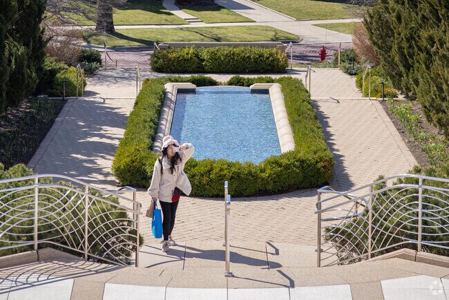 A person takes it all in with a photo at the breathtaking Baháʼí House of Worship.