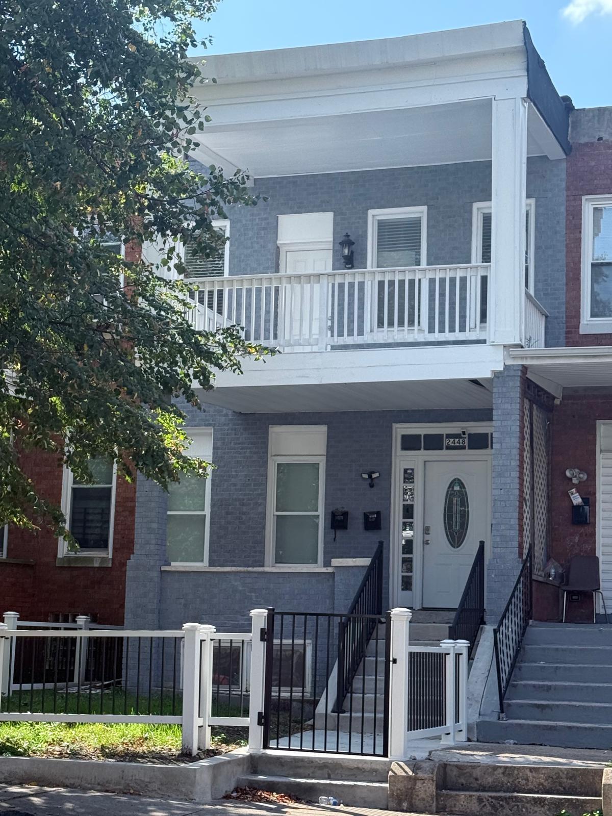 Newly Renovated stairs, porch and fenced front privacy yard with fence
