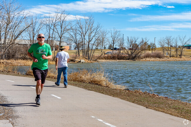 Run, walk or bike along the 1.4 mile loop trail surround the lake at Robert F. Clement Park.