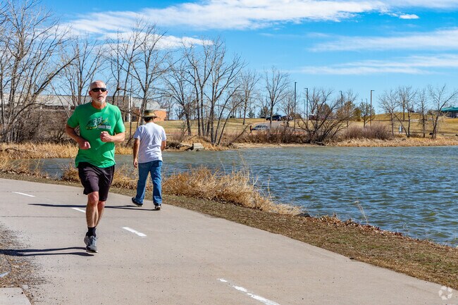 Run, walk, or bike along the 1.4 mile loop trail surrounding the lake at Robert F. Clement Park.