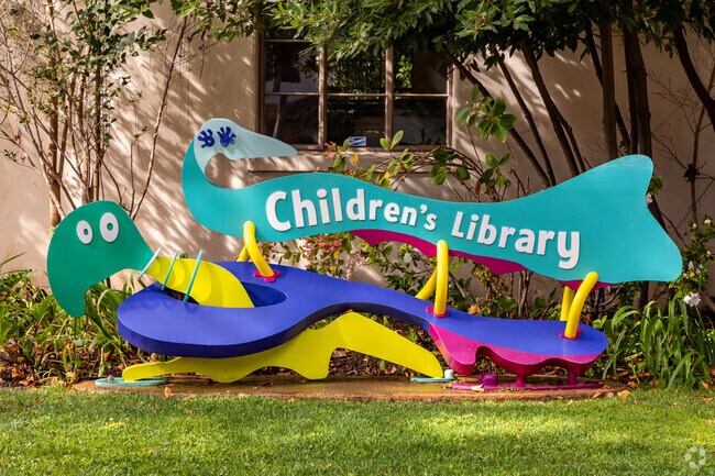 Take your kids to the Children's Library in Community Center and read them their favorite book.