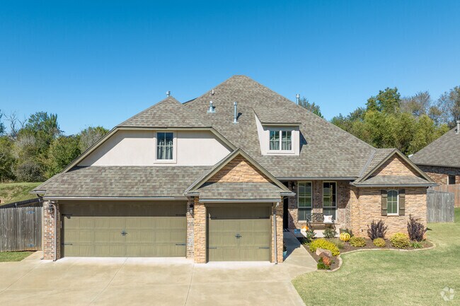 Beautiful landscaping makes this new construction pop in Westmoore.