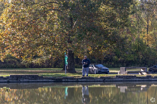 Local residents of Gateway spend their mornings fishing in the lake at Eastwood Metropark.