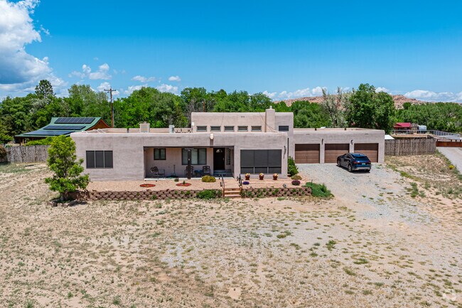 Custom homes in Jacona sit on spacious lots amid arroyos and acequias.