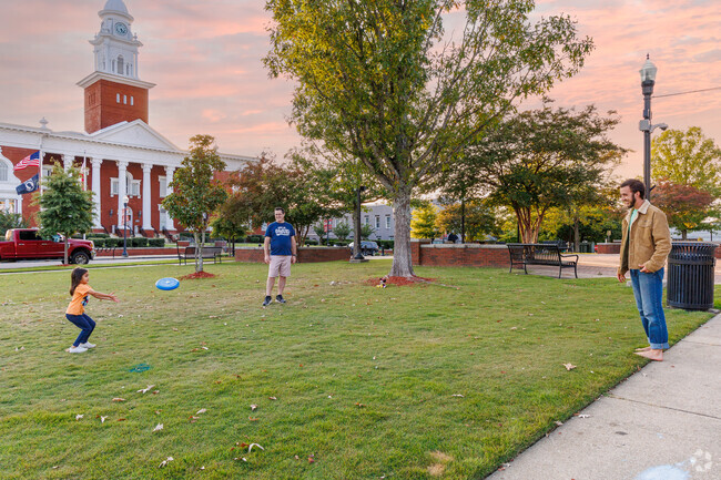 Pine Hills residents can enjoy frisbee with family at any number of nearby green spaces.
