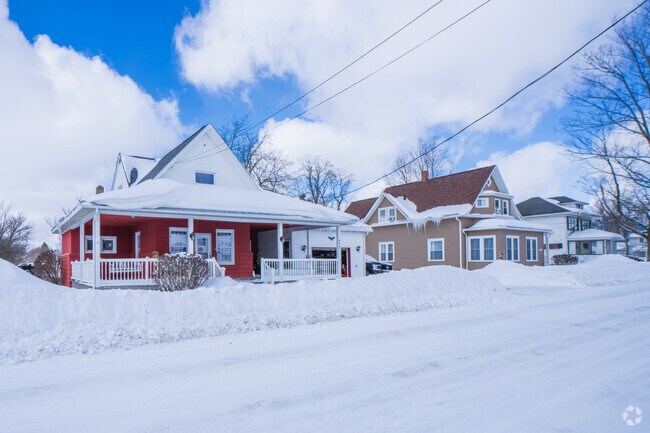 Some Clymer homes have large wrap-around porches that offer a pleasant experience for summer shade and relaxation.