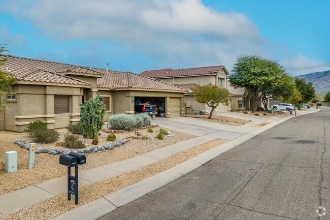 Discover Catalina's Ranch-style homes with Spanish flair, tile roofs, and stucco sides.