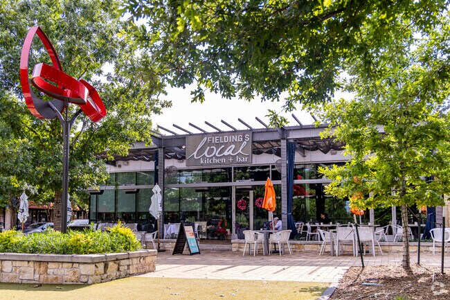Fielding's Local Kitchen & Bar is a popular spot in Creekside Park have drinks outside.