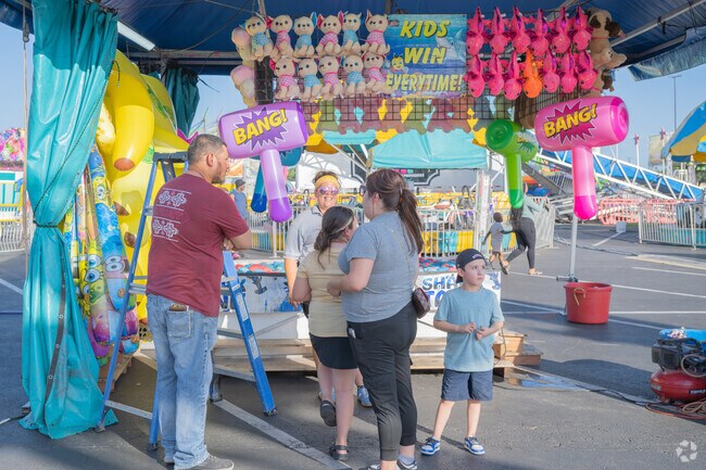 In Potosi City, every kid's a winner at the local fair’s favorite game booths.