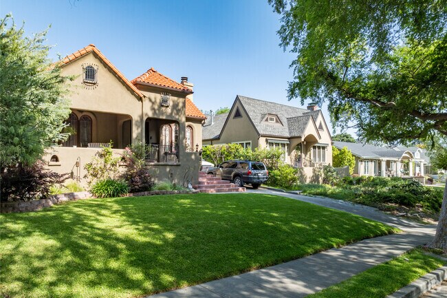 Bungalows and Tudor homes alike have well maintained front lawns in Monrovia.