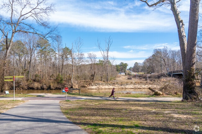 The Neuse River Greenway features over 27 miles of paved trail with scenic views of The Neuse.