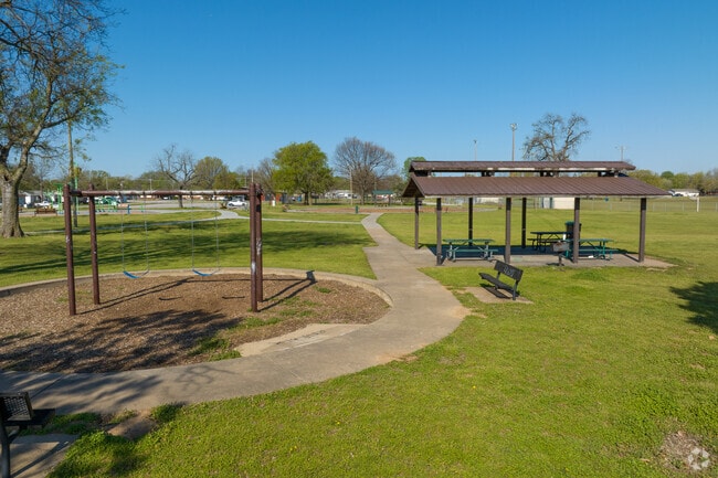 Zeigler Park offers swings and a shaded picnic area for visitors.