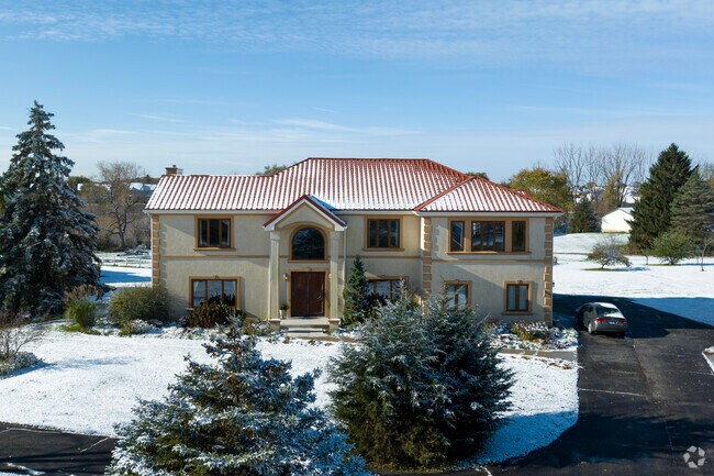 Snow covered estates grace the countryside of Ray Lake Kettle Grove Nature near Volo.