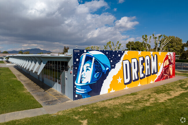Inspiring mural adorns the side of Del Rey class rooms.