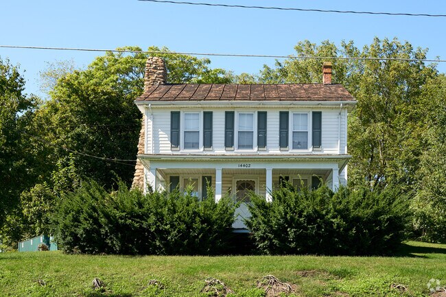 An old Colonial style home sits on the hilltop in Ringgold.