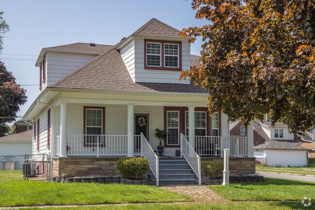Traditional homes with large covered porches are common throughout Ecorse.