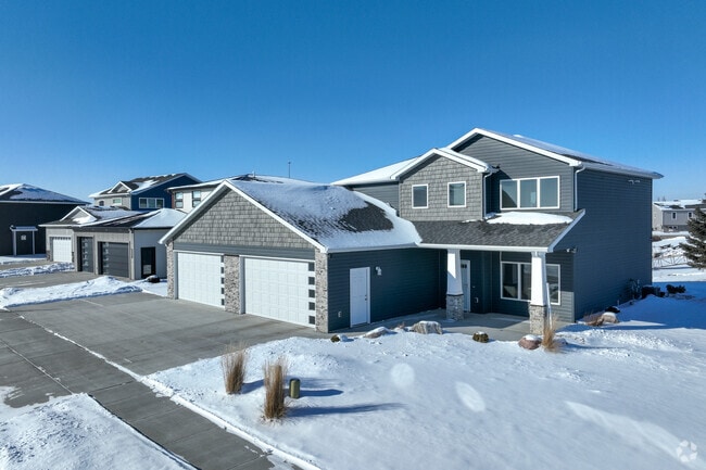 Newer traditional two story homes are being built near the Missouri River.