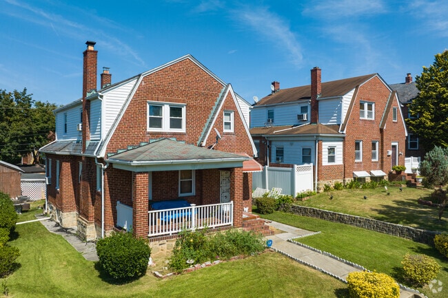 Brick Dutch Colonial homes in Moravia-Walther have plenty of character.