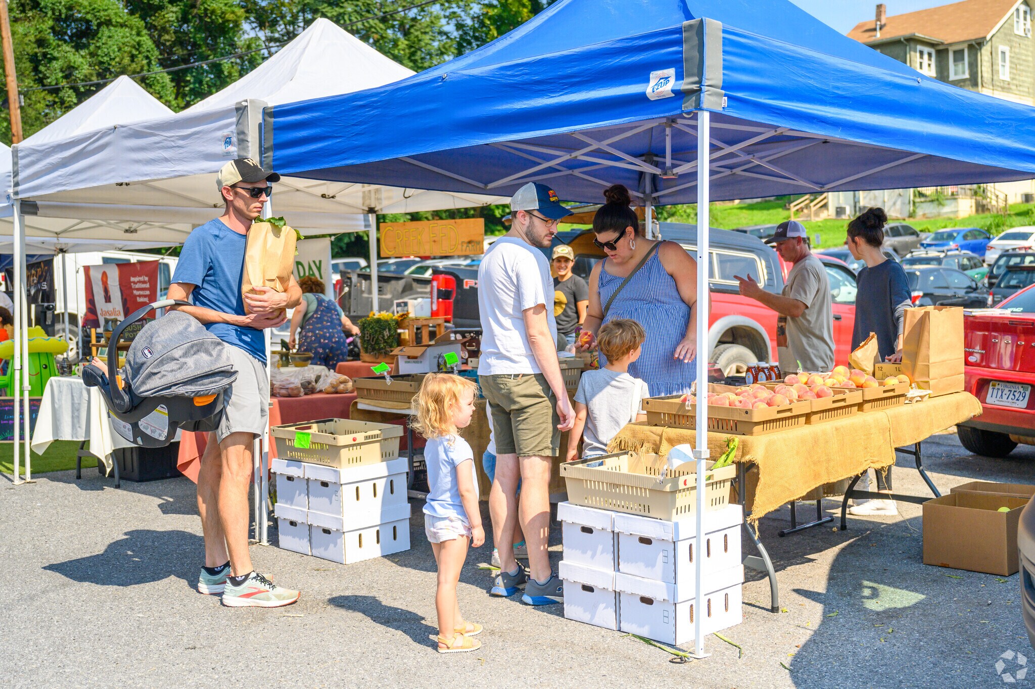 Residents of Norwich attend the Grandin Village Farmer's Market on Saturdays.