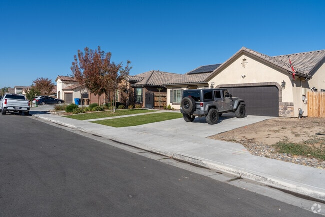 Many of the homes in Panama are newer with nice lawns and decorative trees.