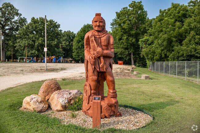 There is a beautiful statue at the Tecumseh Park entry.