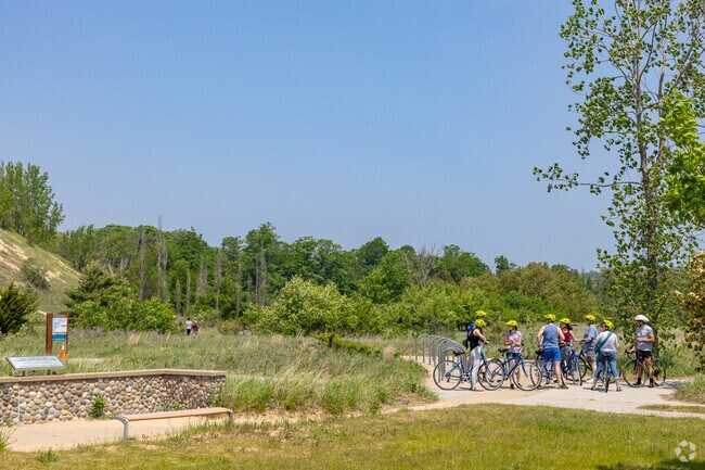 Visitors to the Sleeping Bear Heritage Trail can rent bicycles to traverse the trail quickly.