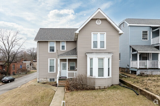 This workers cottage in Clayton-Tamm has been modernized with vinyl siding.