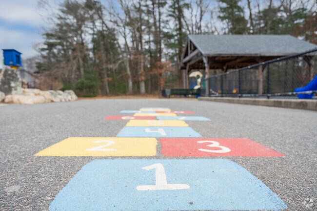Students enjoy hopscotch during recess at William G Vinal in Norwell.