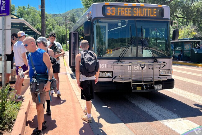 Cedar Heights is a car dependent neighborhood, but nearby Manitou Springs has a free shuttle.