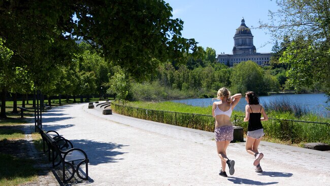 Joggers take advantage of a beautiful day in downtown Olympia.